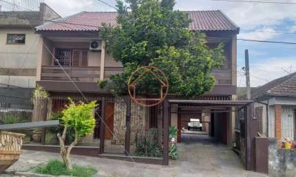 Casa com 3 quartos à venda na Travessa Lençóis, 58, Vila Ipiranga, Porto Alegre por R$ 1.500.000