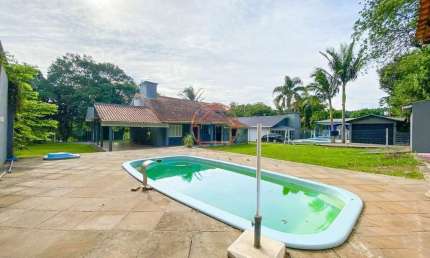 Casa com 3 quartos à venda na Avenida Presidente Getúlio Vargas, 8175, Tijuca, Alvorada por R$ 394.000