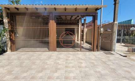 Casa com 3 quartos à venda na Herbert Germano Schneider, 33, Jardim Algarve, Alvorada por R$ 260.000
