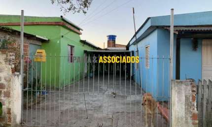 Casa com 4 quartos à venda na Porto Alegre, 894, Jardim América, Capão do Leão por R$ 165.000