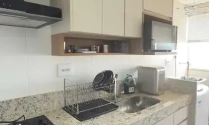 Apartamento à venda no Centro de Uberlândia-MG: 2 quartos, 2 salas, 1 banheiro, 1 vaga de garagem, 46m² de área.