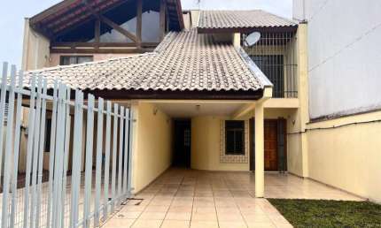 Casa com 3 quartos para alugar na Rua Carlos Benato, 600, São Braz, Curitiba