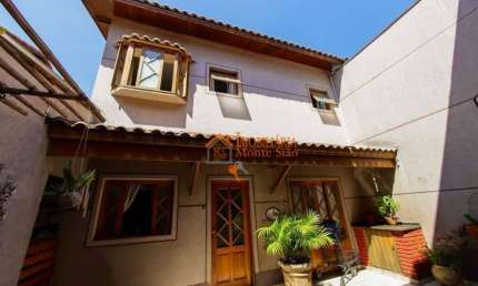 Sobrado com 4 dormitórios à venda, 267 m² por R$ 949.000,00 - Vila Barros - Guarulhos/SP
