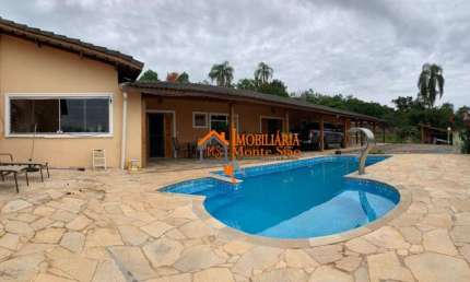 Casa com 4 dormitórios à venda, 300 m² por R$ 2.500.000,00 - Fazenda Velha - Arujá/SP