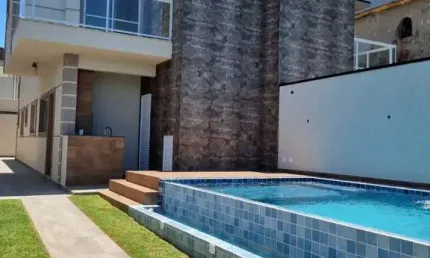 Casa em condomínio fechado com 3 quartos à venda na Avenida Governador Mário Covas Júnior, 4980, Balneário Tupy, Itanhaém, 115 m2 por R$ 698.540