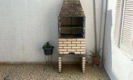 Sobrado com 3 dormitórios à venda, 154 m² por R$ 1.070.000,00 - Gonzaga - Santos/SP