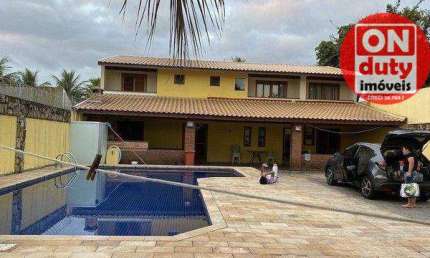 Casa com 6 dormitórios à venda por R$ 1.100.000,00 - Jardim Virginia - Guarujá/SP