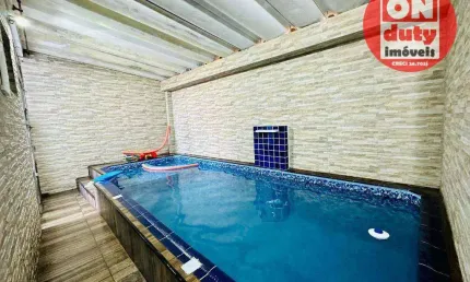 Sobrado com 3 dormitórios à venda, 166 m² por R$ 1.690.000,00 - Boqueirão - Santos/SP