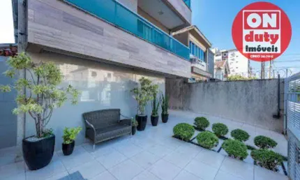 Village com 3 dormitórios para alugar, 136 m² por R$ 6.000,00/mês - Gonzaga - Santos/SP