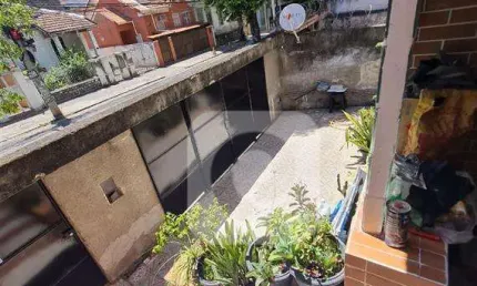 Excelente casa com 3 quartos, vaga e um terraço com churrasqueira!