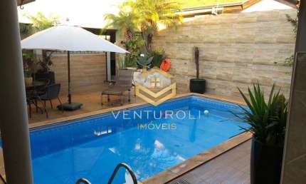 Residência Luxuosa: 4 Suítes, Áreas de Lazer e Escritórios Espaçosos