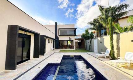 Casa com 4 dormitórios à venda, 400 m² por R$ 4.000.000,00 - Condomínio Reserva do Paratehy - São José dos Campos/SP