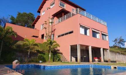Casa com 4 dormitórios, 400 m² - venda por R$ 1.800.000,00 ou aluguel por R$ 8.705,00/mês - Condomínio Reserva Ibirapitanga - Santa Isabel/SP