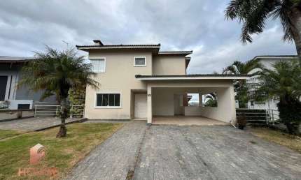 Casa com 3 dormitórios, 330 m² - venda por R$ 2.470.000,00 ou aluguel por R$ 8.500,00/mês - Condomínio Country Club - Arujá/SP