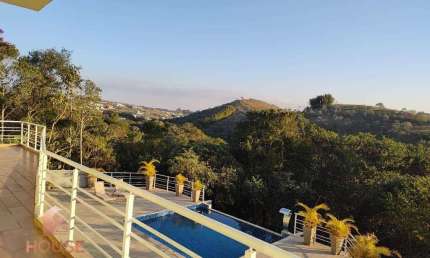 Casa com 4 dormitórios à venda, 380 m² por R$ 1.800.000,00 - Condomínio Reserva Ibirapitanga - Santa Isabel/SP
