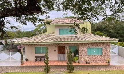 Casa com 4 dormitórios à venda, 350 m² por R$ 1.700.000,00 - Condomínio Reserva Ibirapitanga - Santa Isabel/SP