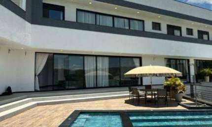 Casa com 4 dormitórios à venda, 690 m² por R$ 3.600.000 - Condomínio Reserva Ibirapitanga - Santa Isabel/SP