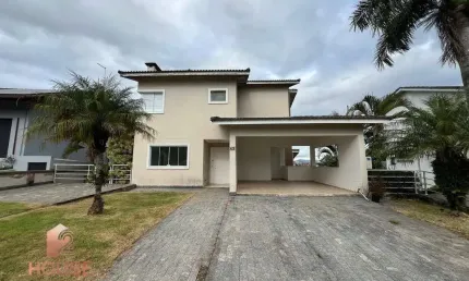 Casa com 3 dormitórios, 330 m² - venda por R$ 2.470.000,00 ou aluguel por R$ 8.500,00/mês - Condomínio Country Club - Arujá/SP
