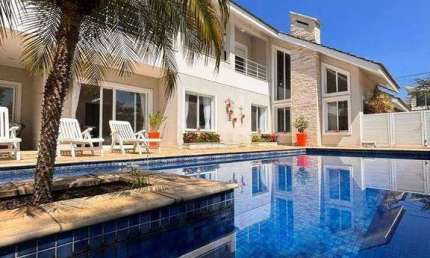 Casa com 4 dormitórios, 600 m² - venda por R$ 2.650.000,00 ou aluguel por R$ 18.000,00/mês - Condomínio Reserva Ibirapitanga - Santa Isabel/SP