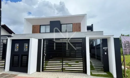 Sofisticação e conforto no coração do Saguaçú - Sobrado geminado com 3 suítes, piscina e 206 m² privativos