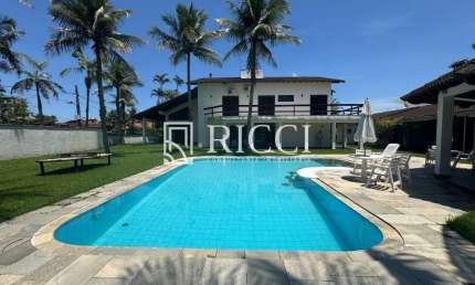 Casa de luxo em condomínio à venda no Jardim Acapulco, Guarujá-SP: 6 quartos, 6 suítes, 6 salas, 9 banheiros, 4 vagas e 555,60 m² de área.