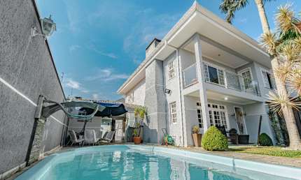 Casa com 4 dormitórios à venda, 344 m² por R$ 1.700.000 - Centro - Pinhais/PR