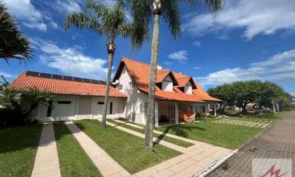 ESTA CASA CHARMOSA PODE SER SUA, SITUADA EM IMBE-RS, CONDOMINIO FECHADO!