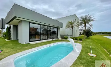 CASA MOBILIADA A VENDA EM CONDOMINIO RESERVA DAS AGUAS EM TORRES-RS.