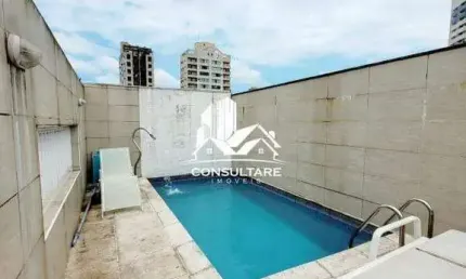 Casa triplex à venda em área nobre de Santos, com 3 quartos (2 suítes), lazer completo no terceiro andar com piscina, churrasqueira, sala de jogos, es