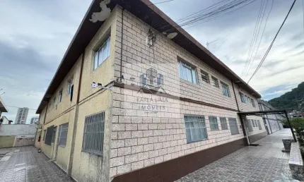 Kitnet / conjugado em canto do forte  -  praia grande
