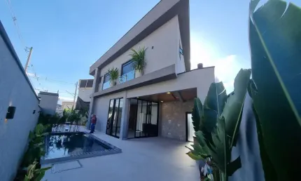 Extraordinaria residência de 3 suítes com piscina e de esquina Cond Nova Jaguari
