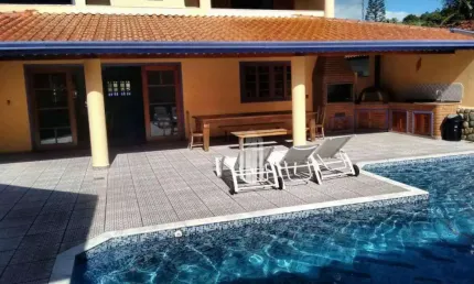 Sobrado com 4 dormitórios à venda, 450 m² por R$ 2.200.000,00 - Arrastão - São Sebastião/SP