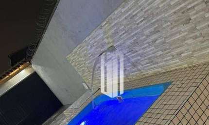 Casa com 3 dormitórios à venda por R$ 850.000 - Jaraguá - Caraguatatuba/SP