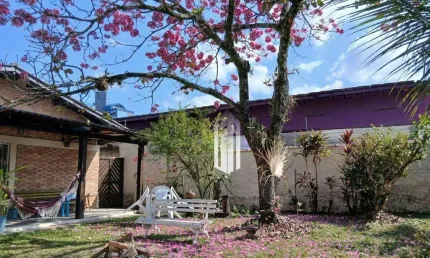 Casa com 4 dormitórios, 256 m² - venda por R$ 2.000.000,00 ou aluguel por R$ 8.284,82/mês - Centro - Caraguatatuba/SP