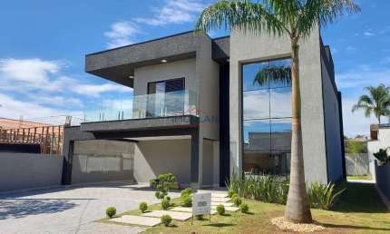 Casa à venda com 4 dormitórios, todos suíte, sendo 1 suíte no piso térreo 360 m²