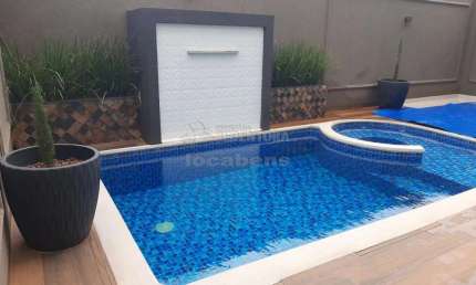 Venda de  sobrado com 03 dormitórios localizado no Residencial Village Damha Rio Preto II.