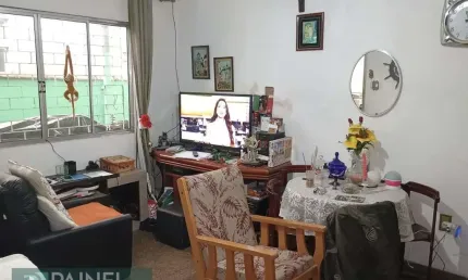 Excelente casa a venda em São Vicente com 4 dormitórios térrea geminada de um lado