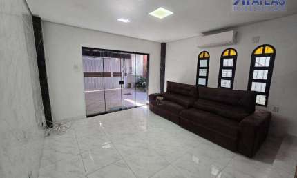 Sobrado com 3 dormitórios à venda, 180 m² por R$ 585.000,00 - Vila Assunção - Praia Grande/SP