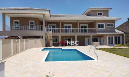 Casa com 3 dormitórios à venda, 600 m² por R$ 3.710.000,00 - Condomínio Arujazinho I, II e III - Arujá/SP