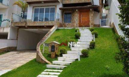 Casa com 3 suítes, sendo 1 master, à venda, 371 m² por R$ 2.200.000 -  Condomínio Arujá V - Arujá/SP
