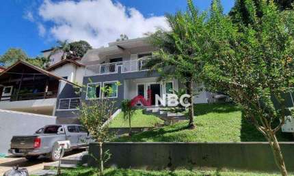 Casa com 4 dormitórios à venda, 298 m² por R$ 2.010.000,00 - Condomínio Country Club - Arujá/SP