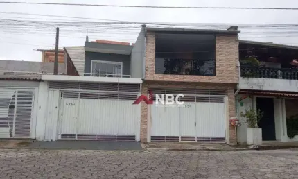 Imóvel composto por 2 casas: uma delas é um sobrado com kitnet e a outra é uma casa individual, 238 m² por R$ 750.000 - Jardim Rincão - Arujá/SP