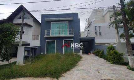 Casa à venda, 180 m² por R$ 1.400.000,00 - Condomínio Aruã - Mogi das Cruzes/SP