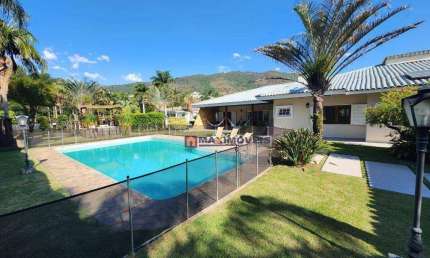 Casa com 7 dormitórios, 600 m² - venda por R$ 5.860.000 ou aluguel por R$ 21.800/mês - Condomínio Flamboyant - Atibaia/SP