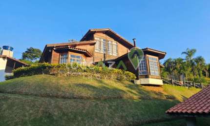 Casa de luxo em condomínio exclusivo em Jacareí-SP: 3 quartos, 1 suíte, 3 salas, 3 banheiros, 20 vagas, 400m². Confira!