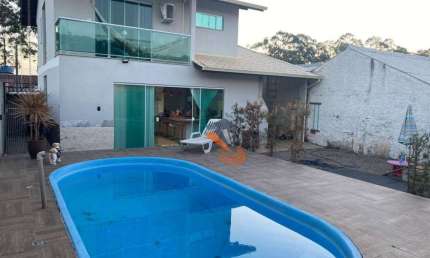 Casa com 3 dormitórios à venda, 160 m² por R$ 700.000,00 - Potecas - São José/SC
