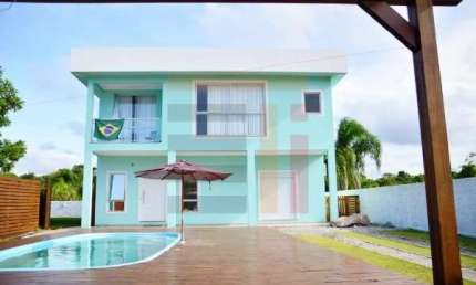 Casa em condomínio fechado com 4 quartos à venda na Rua das Goiabas, 2850, Canasvieiras, Florianópolis por R$ 1.990.000