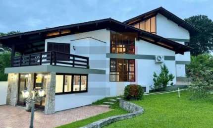 Casa em condomínio fechado com 4 quartos à venda na Rodovia Haroldo Soares Glavan, 1900, Cacupé, Florianópolis por R$ 2.900.000