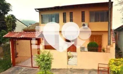 Casa com 4 quartos à venda na Rua Adroaldo Novo Correa, Cavalhada, Porto Alegre