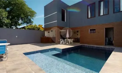 Casa com 4 quartos à venda na Rua Jacundá, Ipanema, Porto Alegre